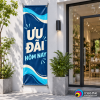 Mẫu in băng rôn dọc quảng cáo với logo bản quyền Vĩnh Phát ở góc ảnh